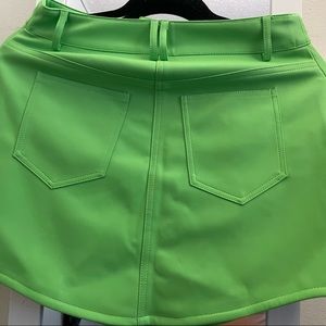 Green faux leather blazer and mini skirt